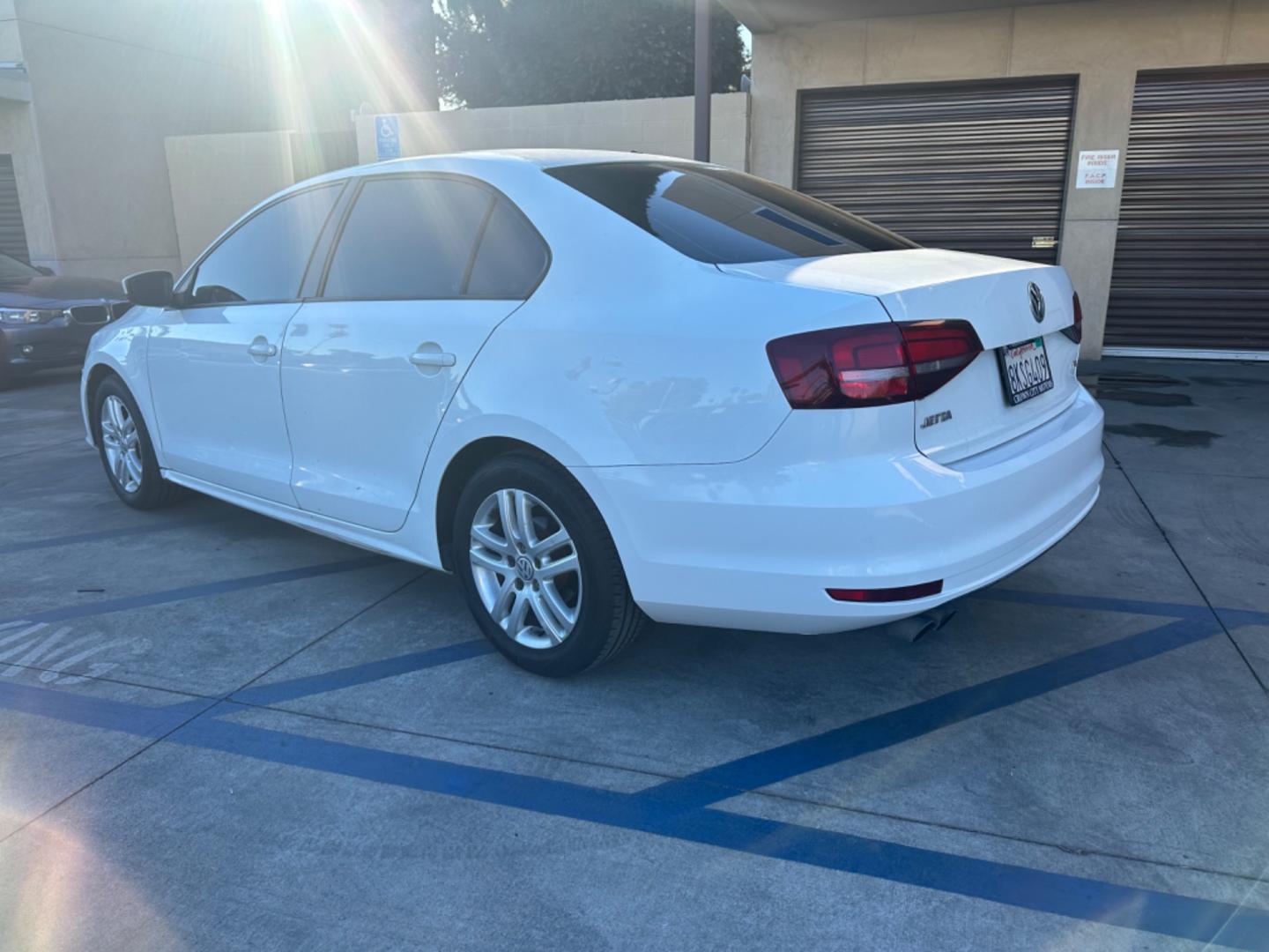 2018 WHITE /BLACK Volkswagen Jetta 1.4T S 6A (3VW2B7AJ9JM) with an 1.4L L4 DOHC 20V engine, 6A transmission, located at 30 S. Berkeley Avenue, Pasadena, CA, 91107, (626) 248-7567, 34.145447, -118.109398 - Photo#2